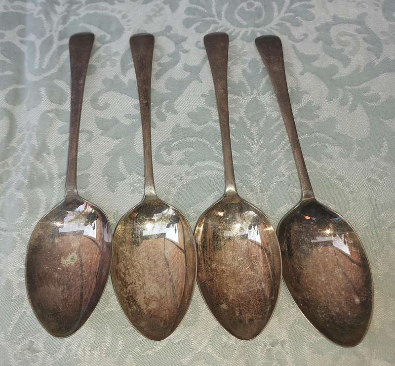 A VINTAGE SET OF 4 EPNS MADE IN ENGLAND TABLE SPOONS SOLD AS IS