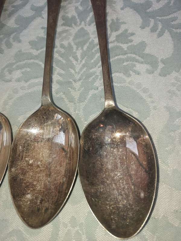 A VINTAGE SET OF 4 EPNS MADE IN ENGLAND TABLE SPOONS SOLD AS IS