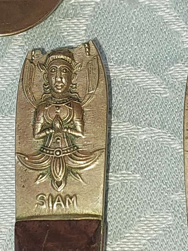 A 72 PIECE SIAM BUDDHA  NICKEL BRONZE CUTLERY SET MADE IN THAILAND SOLD AS IS
