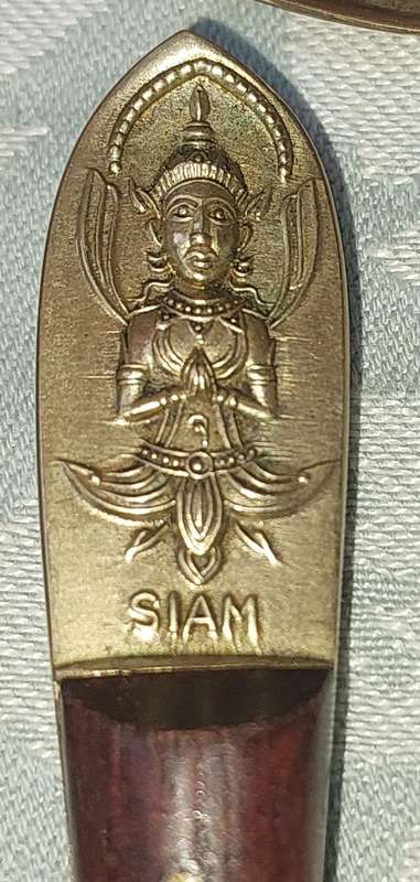 A 72 PIECE SIAM BUDDHA  NICKEL BRONZE CUTLERY SET MADE IN THAILAND SOLD AS IS