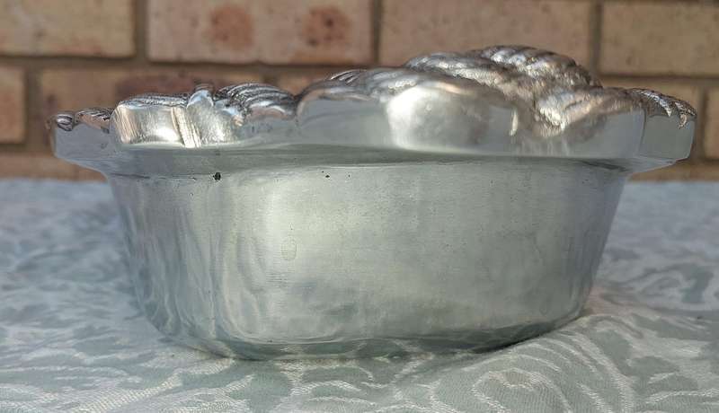 A HECHO MADE IN MEXICO PEWTER SERVING PLATTER SOLD AS IS