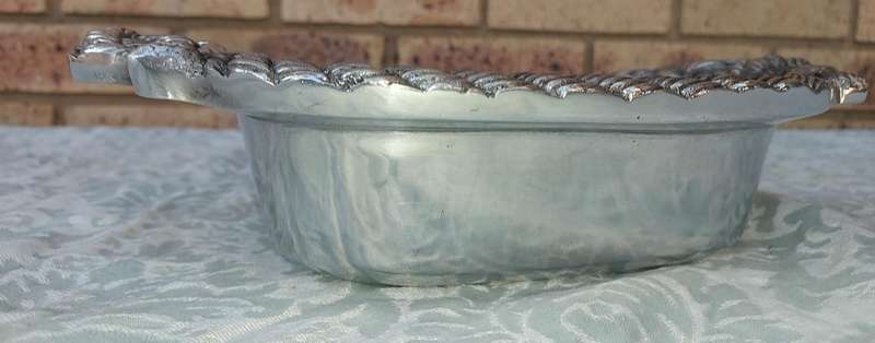 A HECHO MADE IN MEXICO PEWTER SERVING PLATTER SOLD AS IS