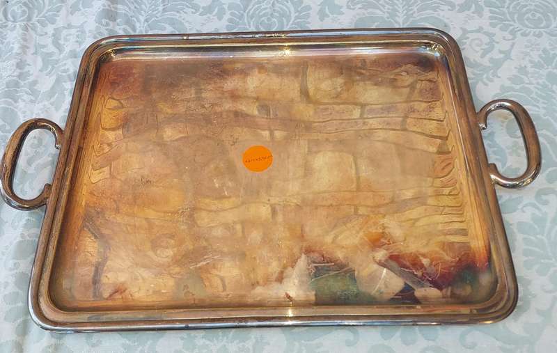 A VINTAGE SILVER PLATED 49 CENTIMETER SERVING PLATTER SOLD AS IS