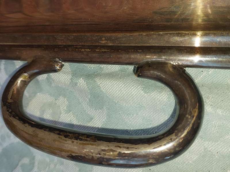 A VINTAGE SILVER PLATED 49 CENTIMETER SERVING PLATTER SOLD AS IS
