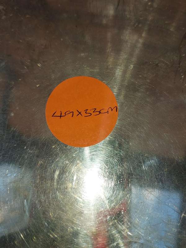 A VINTAGE SILVER PLATED 49 CENTIMETER SERVING PLATTER SOLD AS IS