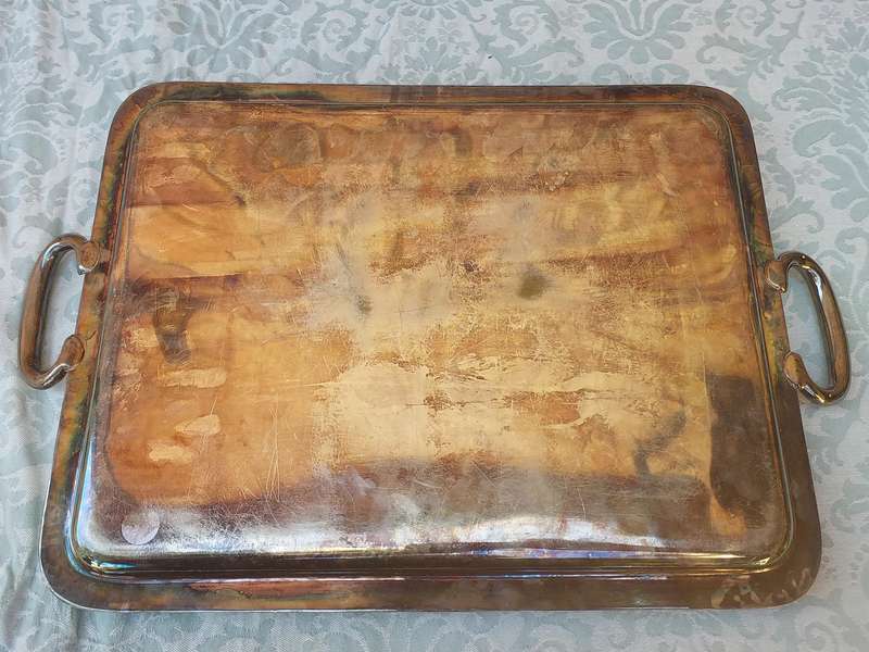 A VINTAGE SILVER PLATED 49 CENTIMETER SERVING PLATTER SOLD AS IS