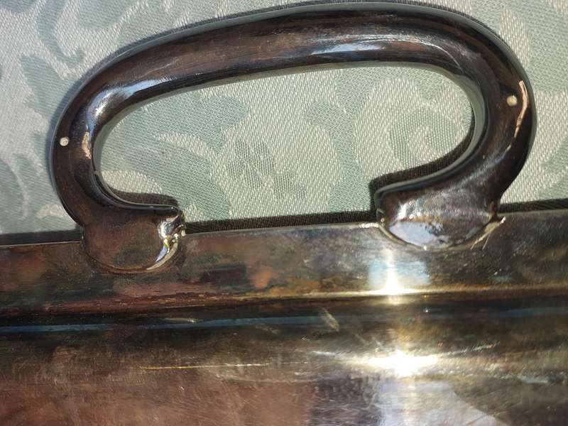 A VINTAGE SILVER PLATED 49 CENTIMETER SERVING PLATTER SOLD AS IS