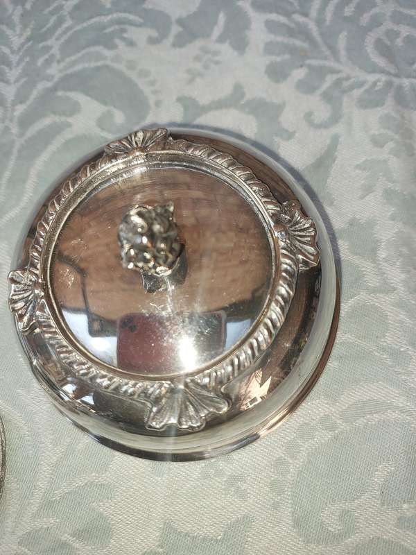 A VINTAGE SILVER PLATED BUTTER DISH SOLD AS IS