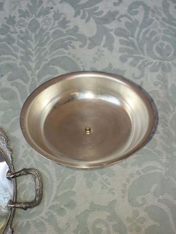 A VINTAGE SILVER PLATED BUTTER DISH SOLD AS IS