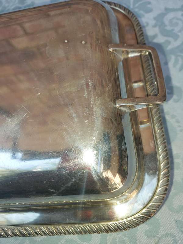 A VINTAGE RECTANGULAR SILVER PLATE TUREEN SOLD AS IS