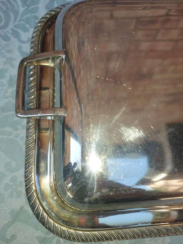 A VINTAGE RECTANGULAR SILVER PLATE TUREEN SOLD AS IS