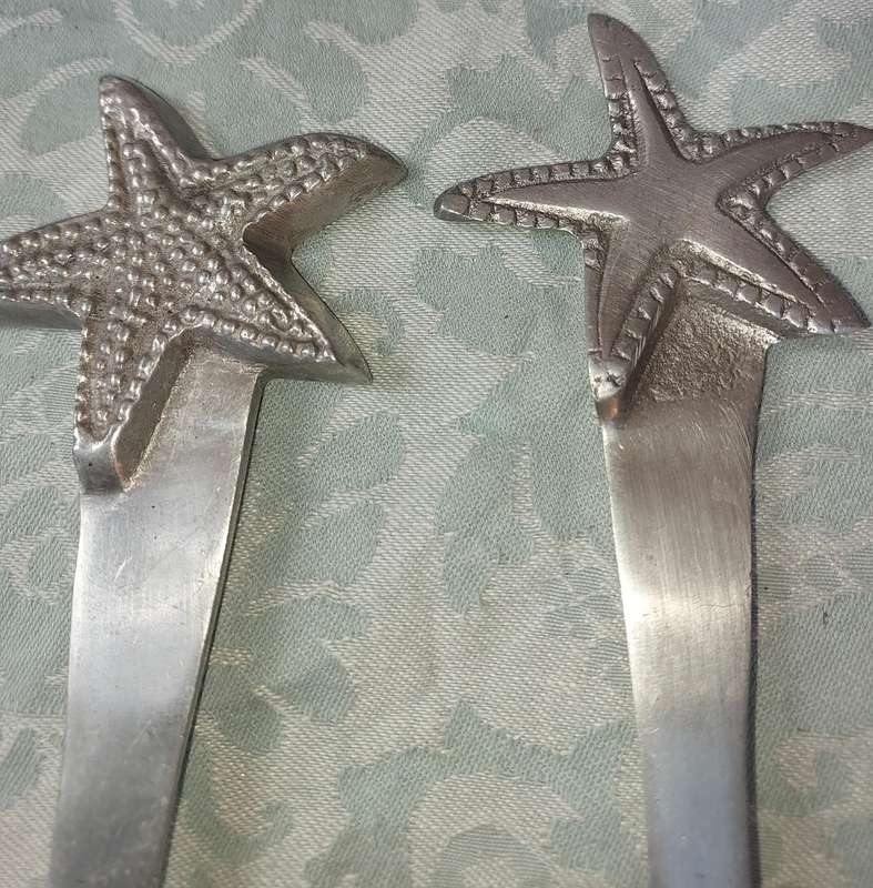 AN ART DECOR PEWTER SET SALAD LADELS SOLD AS IS