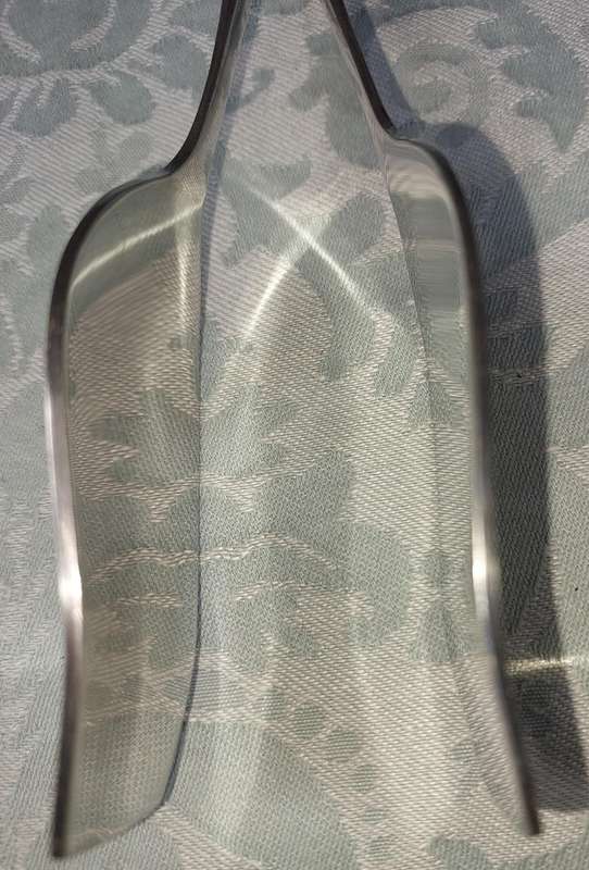 A VINTAGE PAIRS OF SALAD TONGS SOLD AS IS