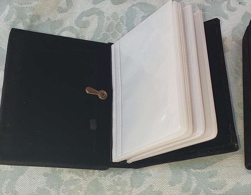 TWO ART DECOR PHOTO FRAME  / ALBUMS SOLD AS IS