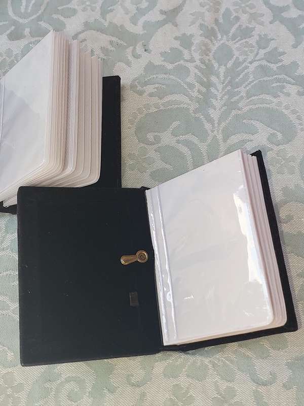 TWO ART DECOR PHOTO FRAME  / ALBUMS SOLD AS IS