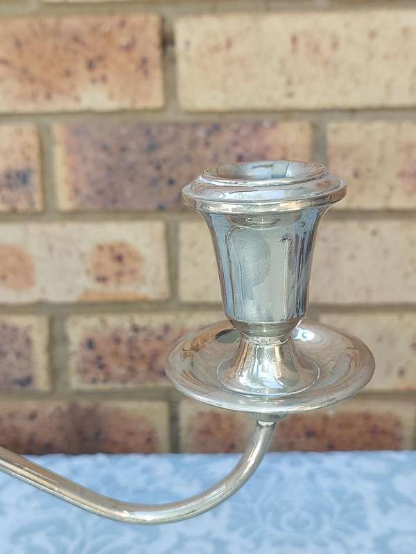 A SILVER PLATED CANDLEBRA NEEDS SOME TLC SOLD AS IS