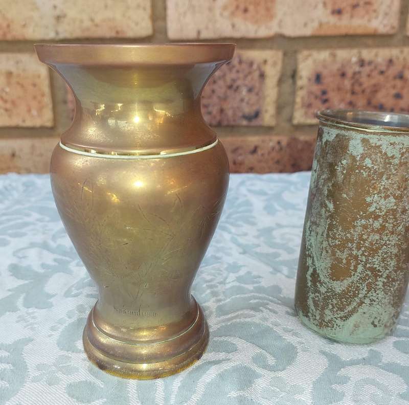 A COLLECTION OF ART DECOR BRASS AND COPPER UTENSILS SOLD AS IS