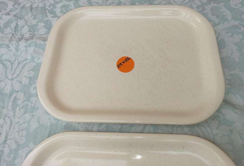 A COLLECTION OF THREE STONEWARE SERVING PLATTERS SOLD AS IS