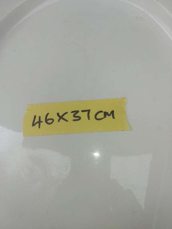 AN ART DECOR OVAL PORCELAIN PLATTER SOLD AS IS
