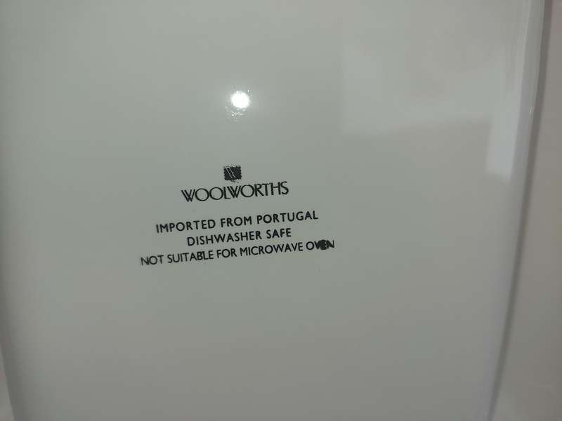 A THREE-DEVISION PORCELAIN SERVING PLATTER IMPORTED FROM PORTUGAL FOR WOOLWORTHS,