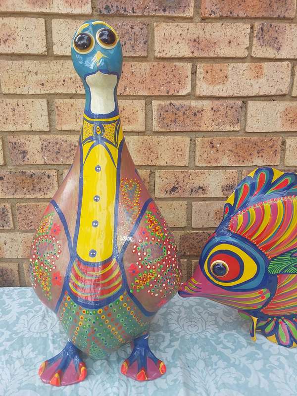 A COLLECTION OF RARE FOLK ART STATUES HIGHLY COLLECTABLE SOLD AS IS