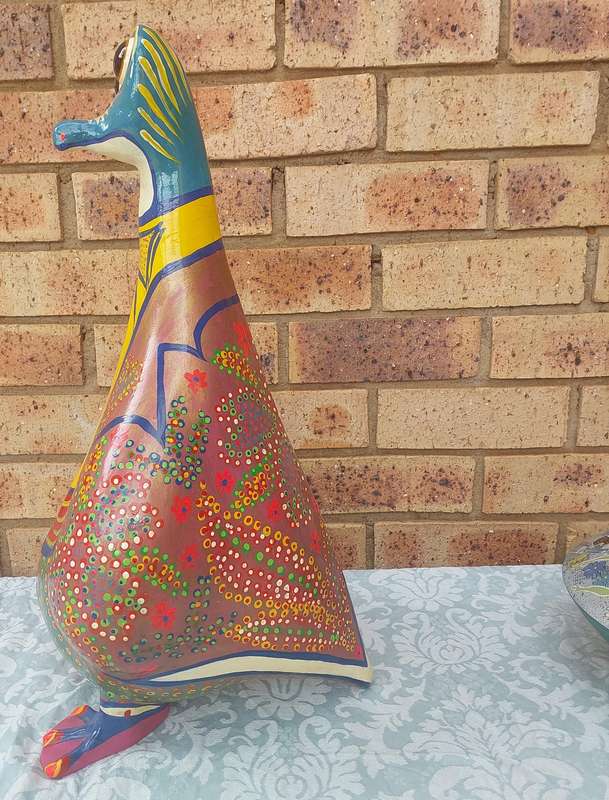 A COLLECTION OF RARE FOLK ART STATUES HIGHLY COLLECTABLE SOLD AS IS