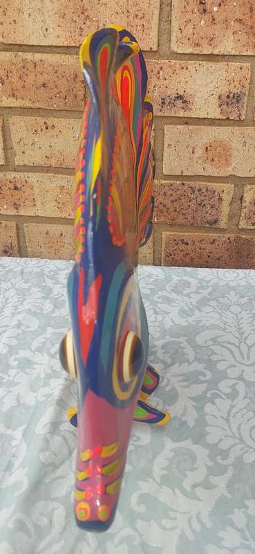 A COLLECTION OF RARE FOLK ART STATUES HIGHLY COLLECTABLE SOLD AS IS