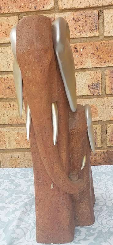 AN ART DECOR WOOD AND ALLOY AFRICAN ELEPHANT COW AND CALF SCULPTURE WITH TRIBAL WARRIERS INLAY