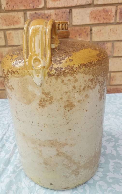 AN ANTIQUE MACDONALD ADAMS & CO LTD GIN CERAMIC JAR WITH A SCREW ON LID NO11  SOLD AS IS