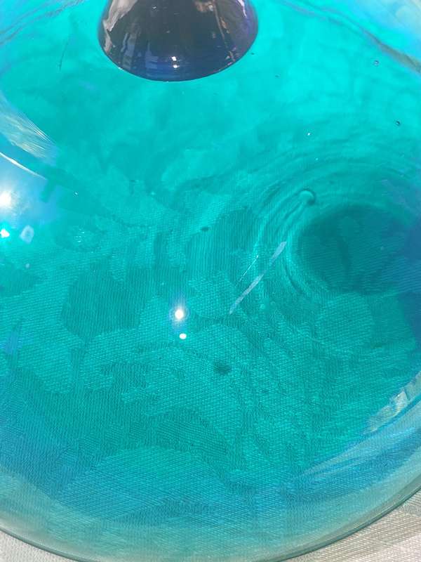 A VINTAGE ART DECOR EXTRA LARGE ICE CREAM COBOLT GREEN AND BLUE FOOTED GLASS BOWL SOLD AS IS