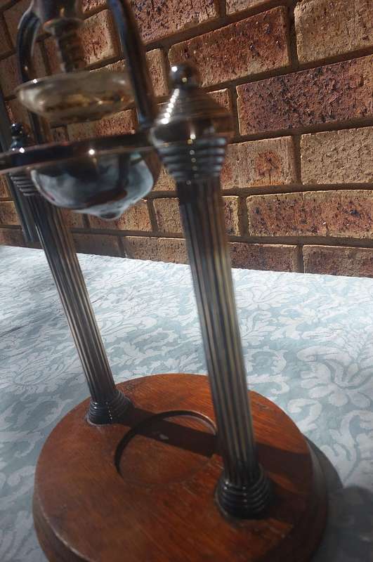 A VINTAGE FRENCH DUCK AND LOBSTER PRESS SILVER PLATED WITH WOODEN BASE SOLD AS IS