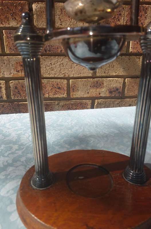 A VINTAGE FRENCH DUCK AND LOBSTER PRESS SILVER PLATED WITH WOODEN BASE SOLD AS IS