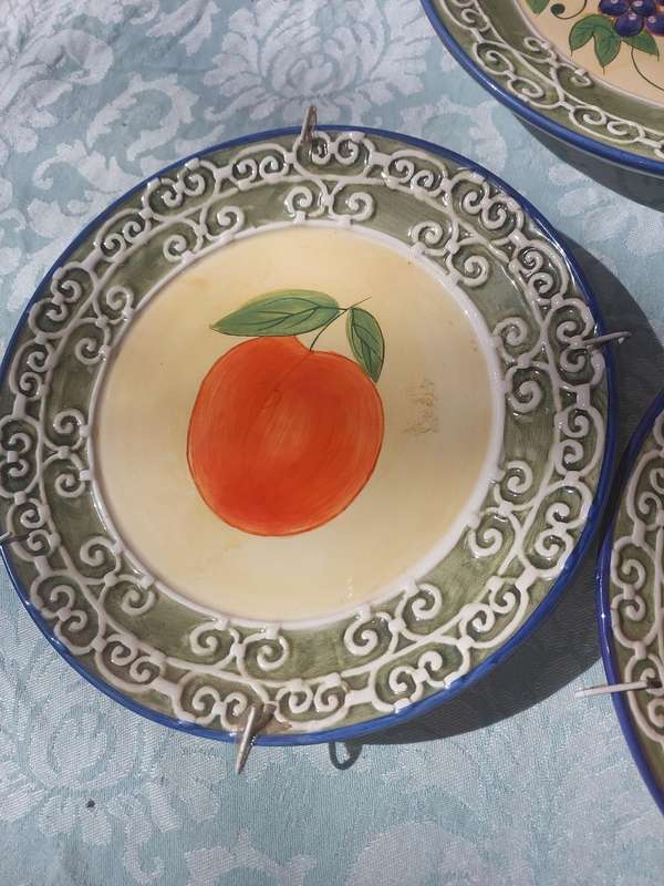 A COLLECTION OF 3 FLORENTINE SALAD PLATE PLAQUES SOLD AS IS