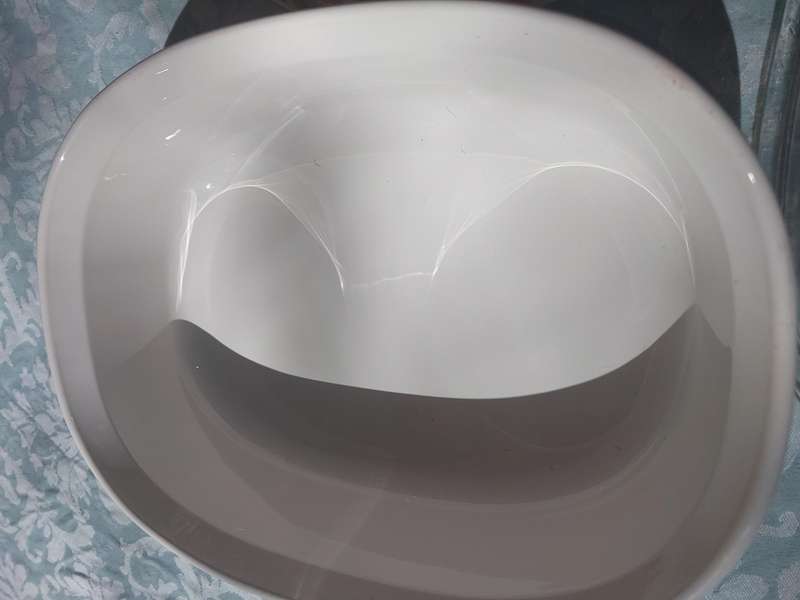 A CORNING WARE CASSEROLE AND A PORCELAIN FLORAL PLATTER SOLD AS IS