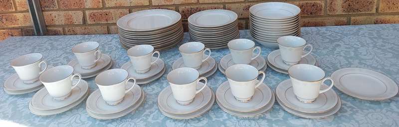 A vintage legendary Sri Lankan Parisian lace Noritake set sold as is