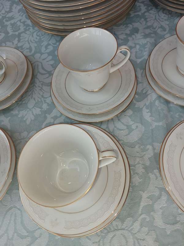 A vintage legendary Sri Lankan Parisian lace Noritake set sold as is