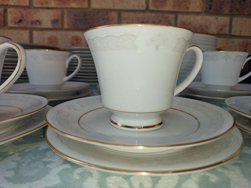 A vintage legendary Sri Lankan Parisian lace Noritake set sold as is