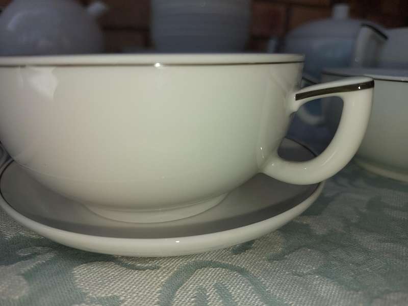 A VINTAGE 47 PIECE WHITE PORCELAIN SET MADE BY ARZBERG GERMANY SOLD AS IS