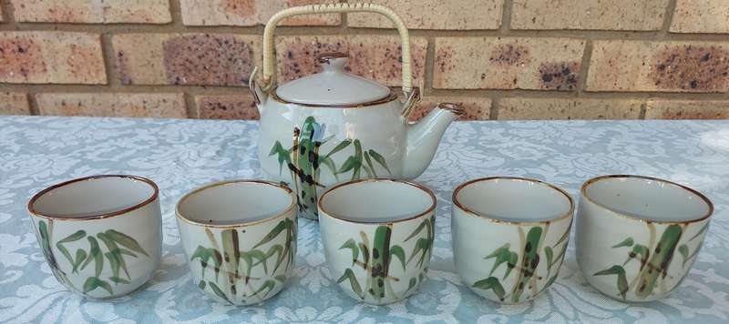 A vintage Yixing tea pot set sold as is