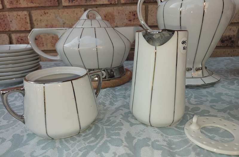 A RARE SIEGMUND MEYER PORCELAIN SET OF COFFEE AND TEA PERCALATORS WITH OUT THE ELECTRIC CABLES