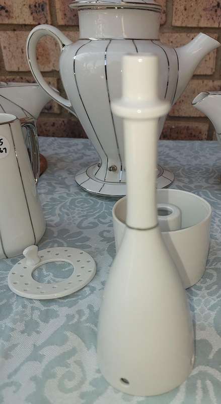 A RARE SIEGMUND MEYER PORCELAIN SET OF COFFEE AND TEA PERCALATORS WITH OUT THE ELECTRIC CABLES