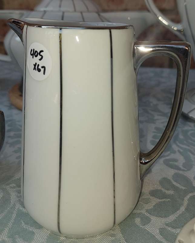 A RARE SIEGMUND MEYER PORCELAIN SET OF COFFEE AND TEA PERCALATORS WITH OUT THE ELECTRIC CABLES