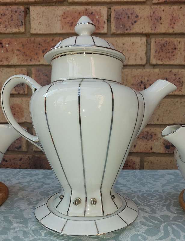 A RARE SIEGMUND MEYER PORCELAIN SET OF COFFEE AND TEA PERCALATORS WITH OUT THE ELECTRIC CABLES
