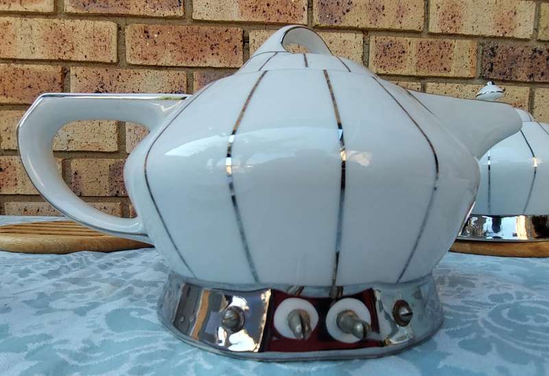 A RARE SIEGMUND MEYER PORCELAIN SET OF COFFEE AND TEA PERCALATORS WITH OUT THE ELECTRIC CABLES