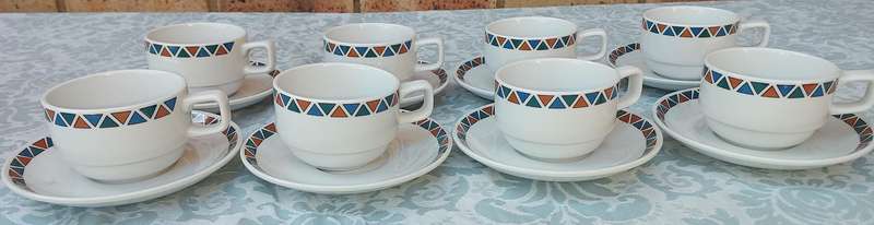 A SET OF CUPS AND SAUCERS BY ROYAL PORCELAIN KINGDOM OF  THAILAND SERIES 02 SOLD AS IS