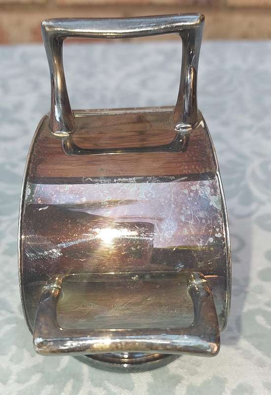 AN ORNATE SILVER PLATE SUGAR SCUTTLE MADE IN SHEFFIELD ENGLAND