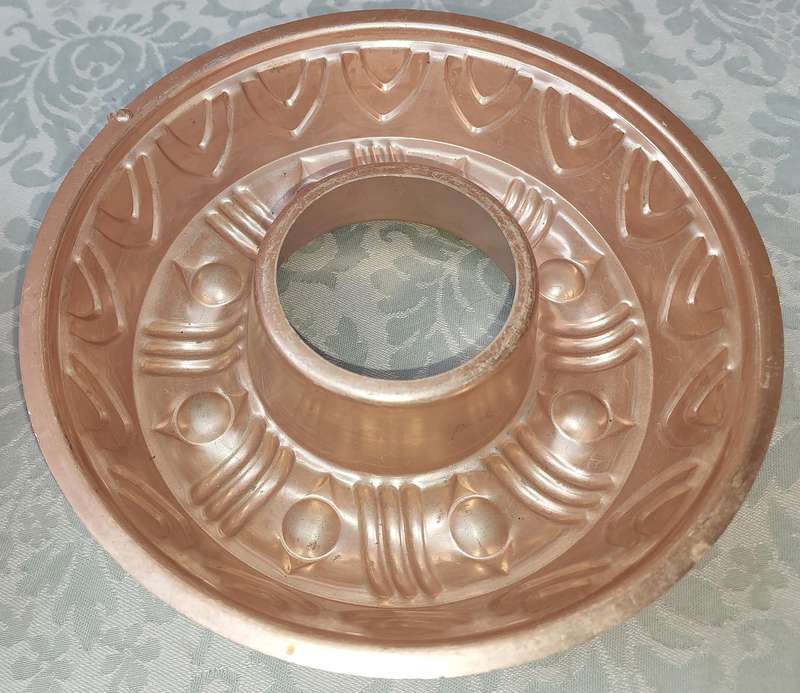 A COLLECTION OIF COPPER BAKING DISHES SOLD AS IS