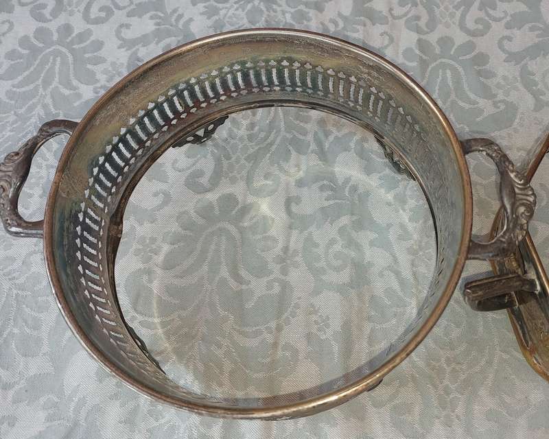 A COLLECTION OF VINTAGE SILVER PLATED CADDY BASKETS SOLD AS IS