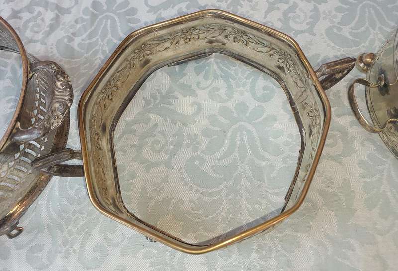 A COLLECTION OF VINTAGE SILVER PLATED CADDY BASKETS SOLD AS IS