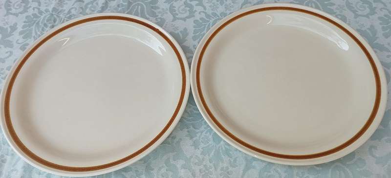 TWO GENUINE STONEWARE VANILLA SPICE PLATES SOLD AS IS